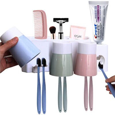 MEIJUBOL Toothbrush Holder Wall Mounted Automatic Toothpaste Squeezer